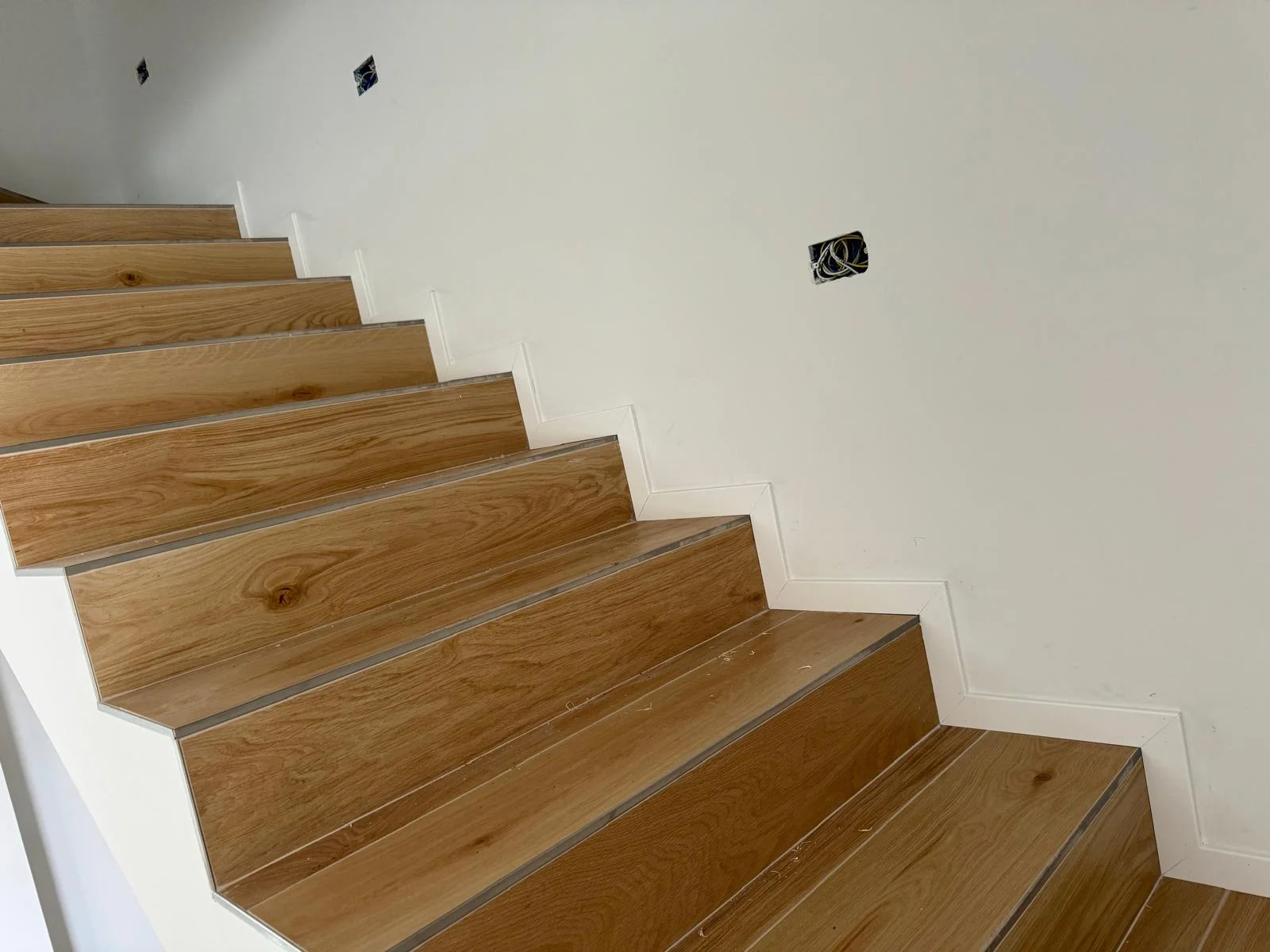 Lavoro Spazio Group SRL — Rivestimento scale in legno a Milano, intervento 10